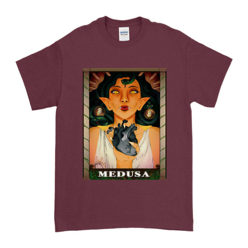 Medusa’s Black Heart Tee featuring an illustration of Medusa holding a black heart, designed by Sianna E.
